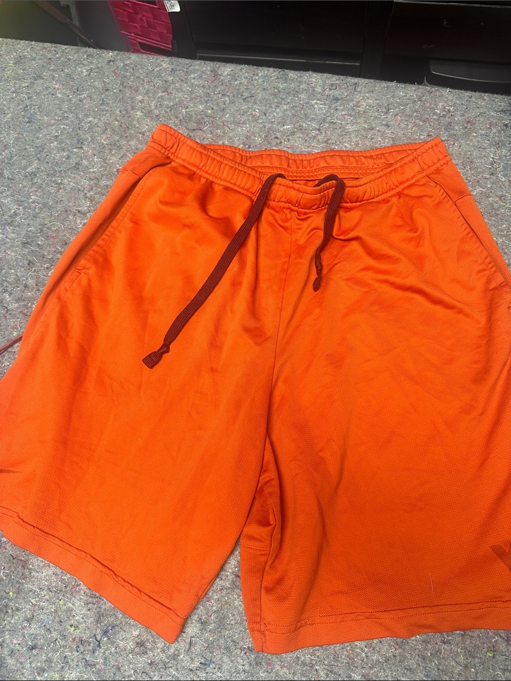Nike Men's Bright Orange Athletic Mesh Shorts with Dark Orange Drawstring